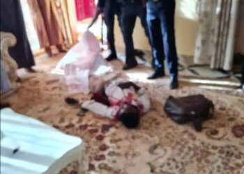 The victim, lying on the floor