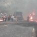 Vehicles in flames after the collision at the Dschang Cliff