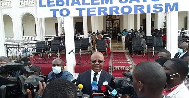 Minister Paul Tasong responding to questions from the press