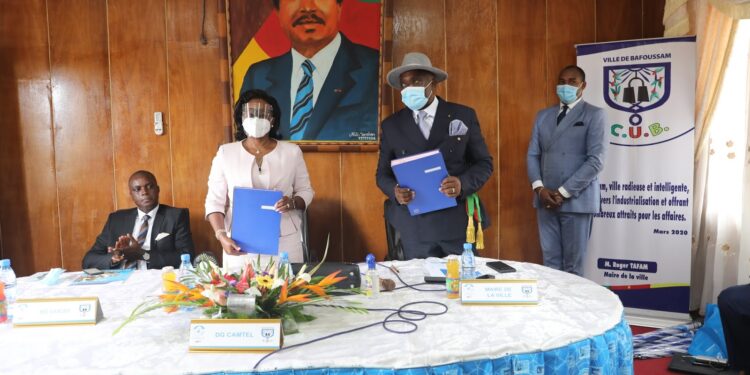 Camtel's GM, Judith Yah and Mayor Tafam Roger