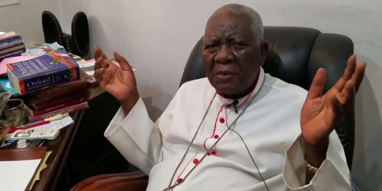 Christian Cardinal Tumi granting an interview to reporters in his office