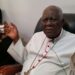 Christian Cardinal Tumi granting an interview to reporters in his office