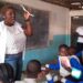 Vanessa Berinyu, Human Resource Manager at DHF schooling the students on the use of menstrual pads