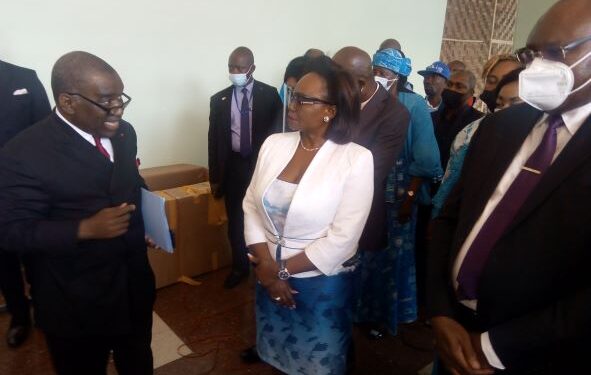 Camtel's General Manager cross-checking the digital installations at the Yaounde Conference Center