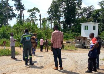Security forces guarding one of the entrances into the Nachtigal Hydro Power Project site