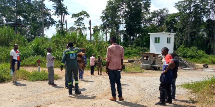 Security forces guarding one of the entrances into the Nachtigal Hydro Power Project site