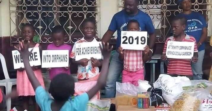 G2G Humanitarian Foundation celebrating with kids in Douala