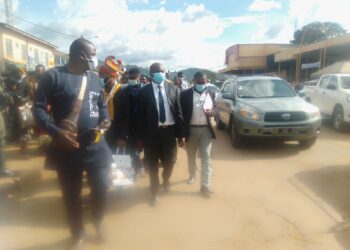 Hon. Agho Oliver, marching along with the population of Bafut - Tubah behind him