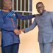 New MEJU President, Charm Victor Bama (R), being congratulated by former president, Jam Charles (L)