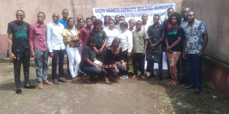 Officials of Game Changers in group photo with participants of the green growth capacity building workshop in Yaoundé