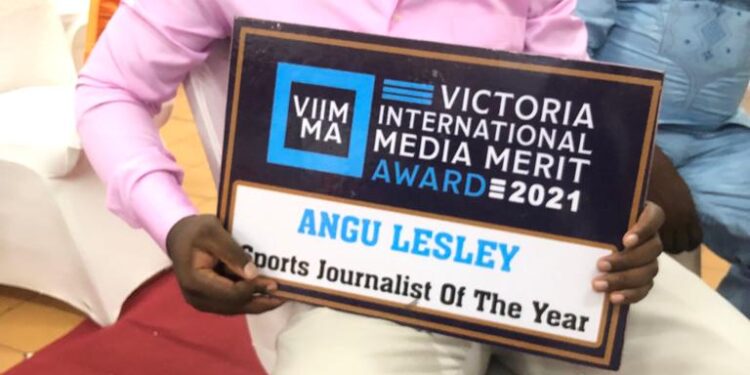 Writer, Angu Lesley with his VIIMMA Award 2021