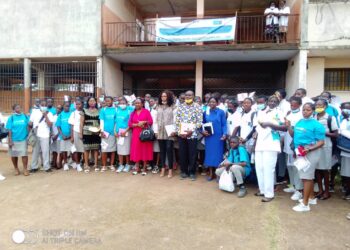 Officials and students at the end of the campaign