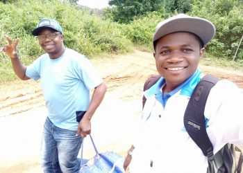 Mr Kimbi(L) and colleague of UFC on humanitarian work