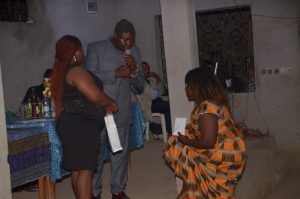 One parent receiving the envelope on behalf of her son