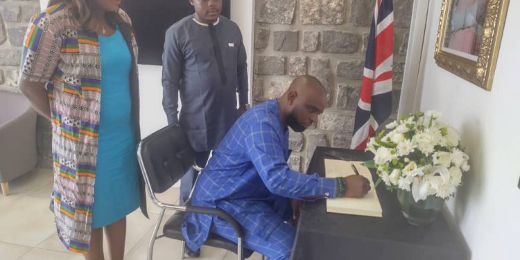 CAMASEJ National President Signing the Condolence Register in the Presence of Some Yaounde Chapter Exco Members at the British High Commission in Yaounde
