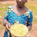 A Bantu woman in Gribe, Boumba and Ngoko Division of the East region presenting already extracted'Njangsa', ready for marketing