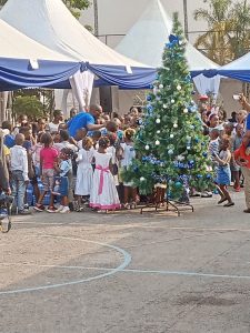 Cross section of children at the Christmas tree ceremony at Club Camtel