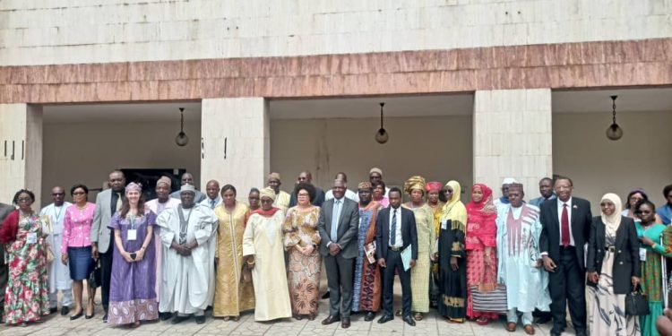 Government officials, scribes of KDI and Minderoo Foundation in group photo shortly after the launch of the application