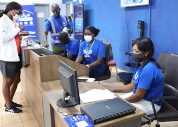 Customer appreciating quality services at Blue counters