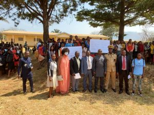 Hon. Agho Oliver and entourage in pictures with school authorities plus students 