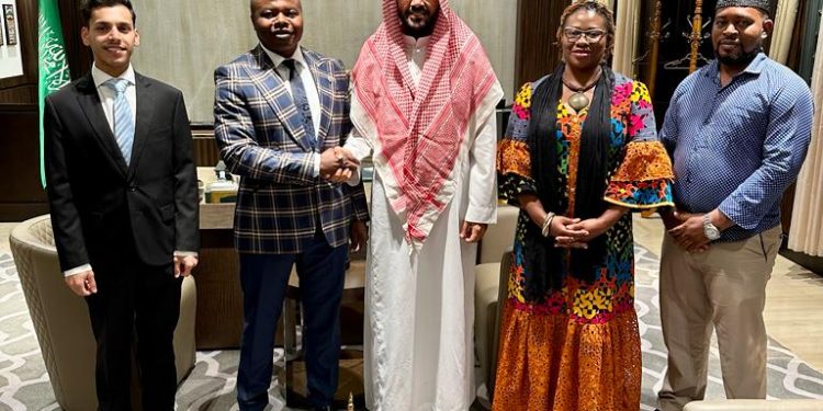 Hon. Agho Oliver Bamenju (2nd from left) greeting the Saudi diplomat at the end of the audience