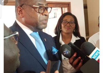 Hon. Louis Henri Ngatcha, President of the Parliamentary Network for Decentralised and Cross Border Cooperation speaking to the press after the signing ceremony in the presence of Madam Jocelyne Essam Epse Ngassa, promoter of Smartteam Consulting