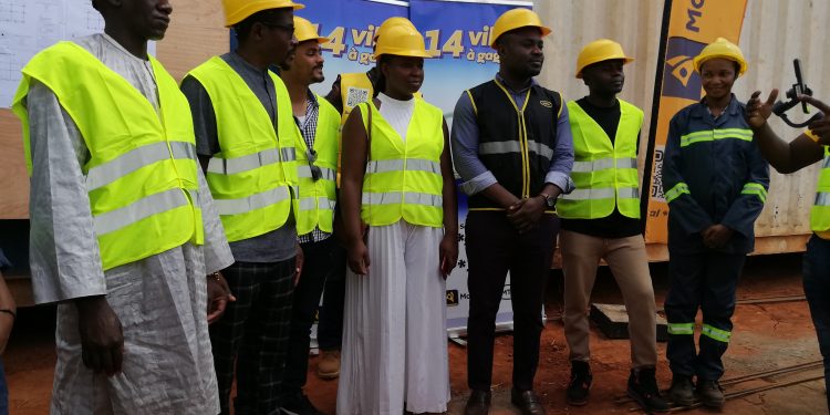 The four lucky winners of the MTN Chance Promotion with MTN Cameroon officials at the contribution site of their future villas
