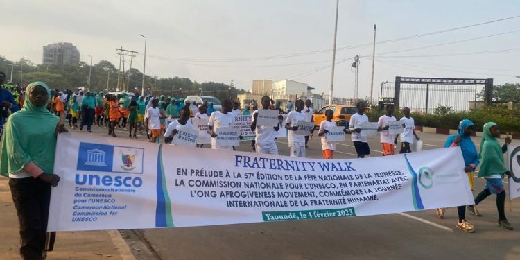 Youths walking along the streets of Yaounde within the 2023 fraternity walk