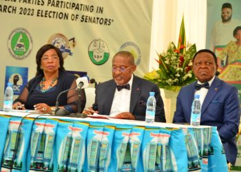 Board chairperson of Elecam, Enow Abrams Egbe (Middle) reading out the list of validated candidates