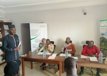 The coordinator of GDA, Aristide Chacgom (standing) announcing the start of the ceremony to present proposals from over 20 CSOs