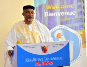 Board chair of Elecam, Enow Abrams Egbe at the opening of the fourth session as of right