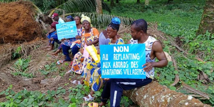 Population brandishing placards on the said land