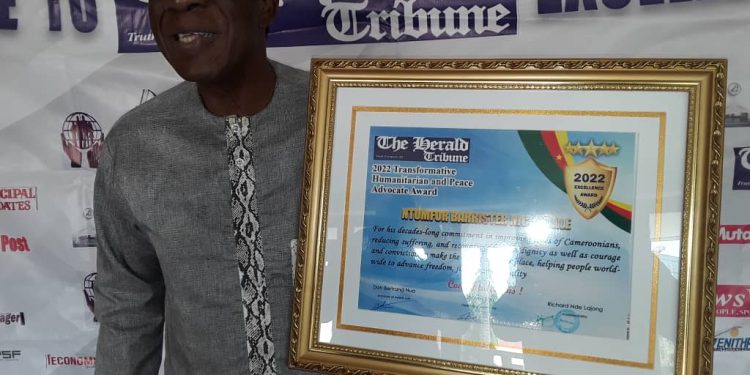 Ntumfor Barrister Nico Halle brandishing his award