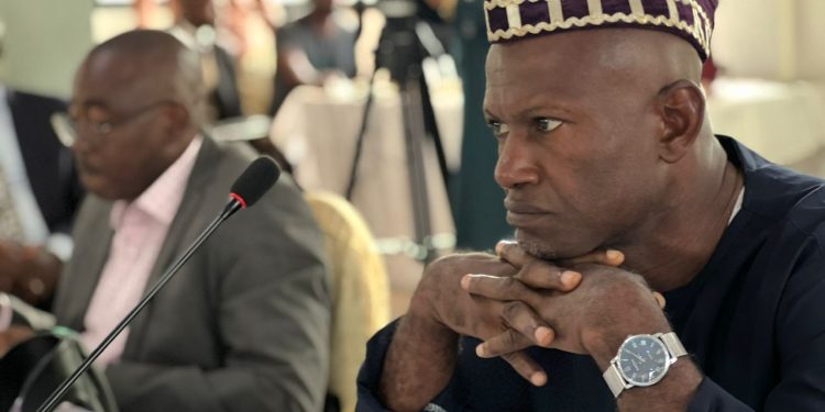 Senior investigative freelance journalist, Franklin Sone Bayen (R) at a panel discussion on the occasion of wpf