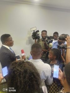 Solomon Agborem speaking to the press after the conference 