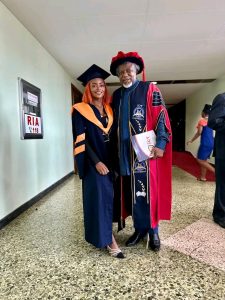Eric Chinje and one of the graduates from the class of 2023 at the ICT University