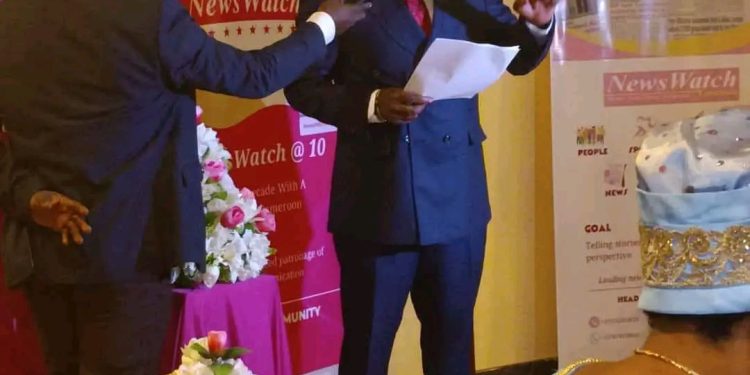 Ndi Eugene Ndi, publisher of Newswatch newspaper delivering his anniversary speech