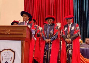 CRTV General Manager, Charles Ndongo, at the rostrum accompanied by Eric Chinje and the Vice Chancellor of the ICT University