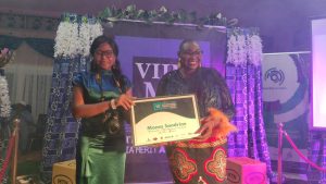 Moma Sandrine receiving her award during VIIMMA 2023 in Limbe