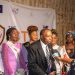 Prof. Jean Emmanuel Pondi talking to the press accompanied by the beauty pageants of the ICT University