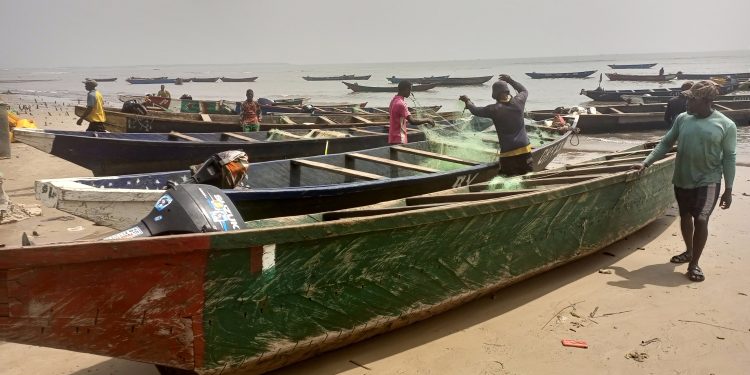 Engine boats anchored on the shores of Idabato are useful in transporting people and goods