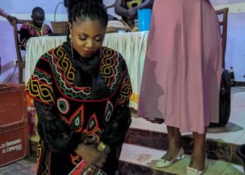 Delly Singah receiving blessings from home community in Yaounde