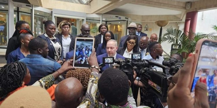 Top rank guests at the summit talking to the press