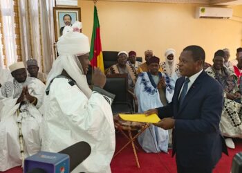 Lamido of Garoua, Ibrahim El Rachidine handing motion to Minister Paul Atanga Nji